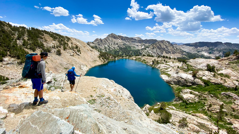 Father and son hike near a lake in the Ruby Mountains, Nevada
