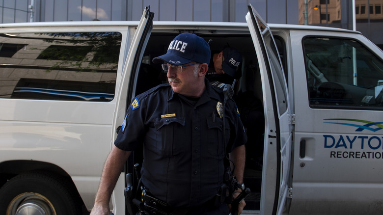 A Dayton police officer leaving his van