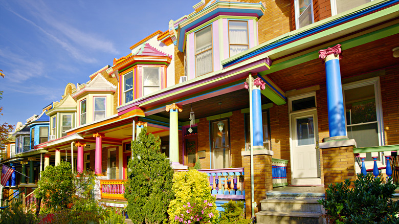 Painted victorian homes with blue sky in background