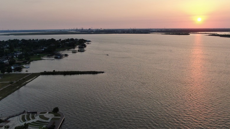 The sun sets over Lake Charles