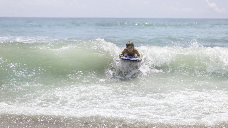 Boy on surf board