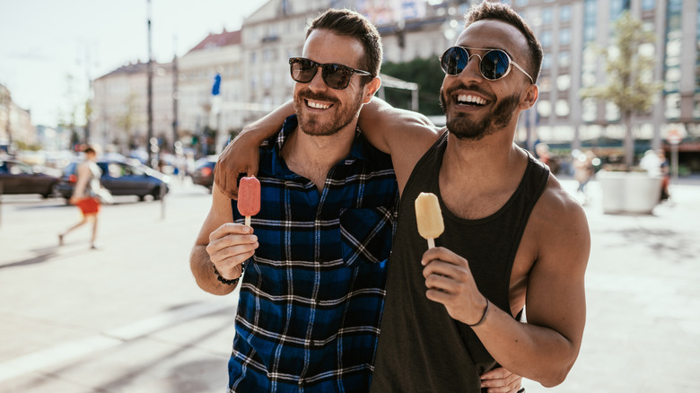 Two men with popsicles