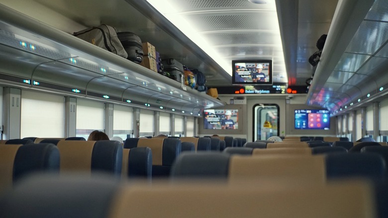 The passenger cabin on the KA Fajar Utama Solo train in Indonesia.