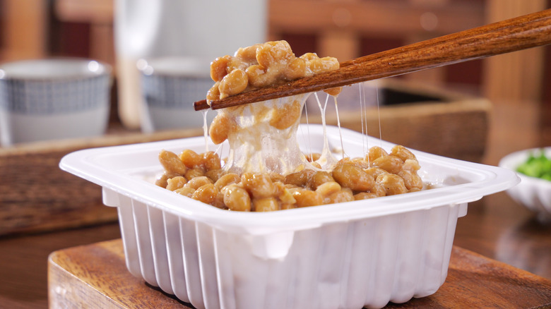 Chopsticks holding natto