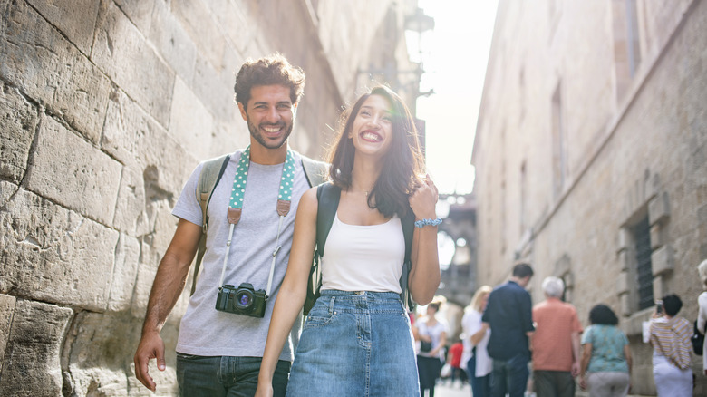 A tourist couple in a European city in summer