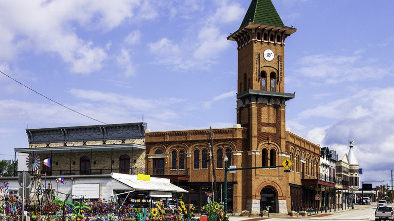 A historic clock tower and shops in Grapevine, Texas