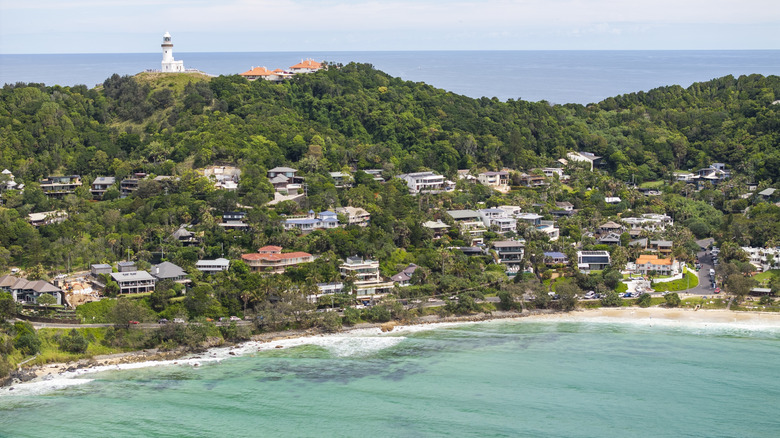 Elevated scenic views of a lighthouse and other buildings along Wategos Beach in Byron Bay, New South Wales, Australia