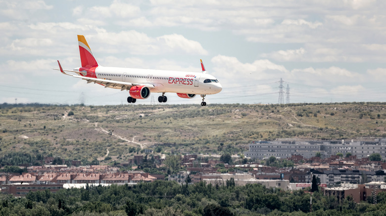 Iberia Express plane landing in Madrid, Spain