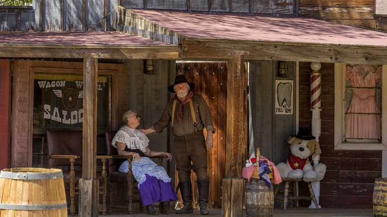 Elderly couple on a porch in Pioneertown, California