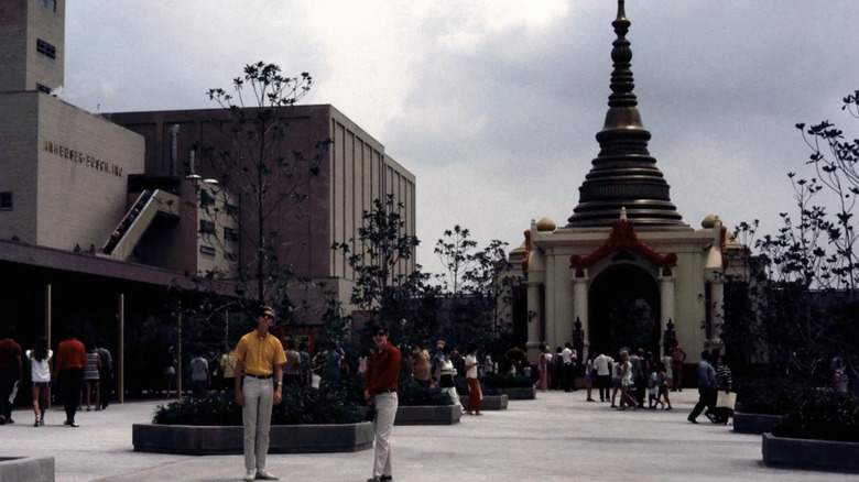View of people enjoying Asian-themed Busch Gardens Houston in the early 1970s with a pagoda in the background and Anheuser-Busch brewery on the left