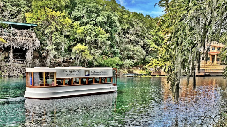 View of glass-bottom boat tour at the Meadows Center for Water and the Environement, formerly Aquarena Springs amusement park in Texas