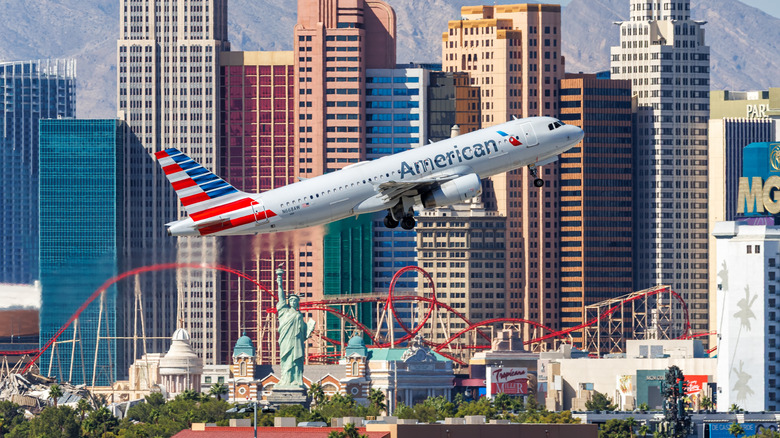 Airplane leaving from the Las Vegas airport and flying in front of the Strip