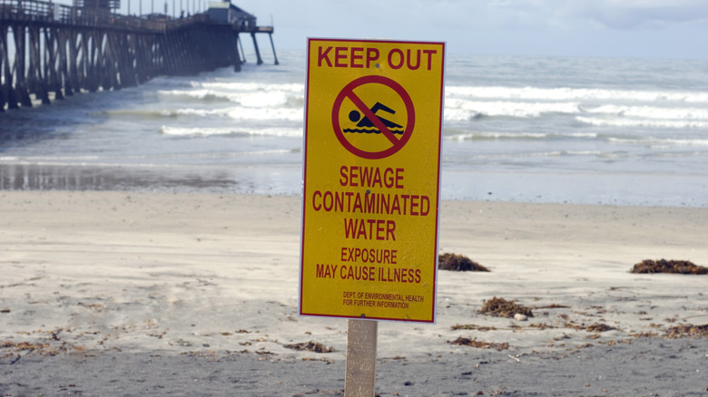 Sign warning swimmers not to go into the water