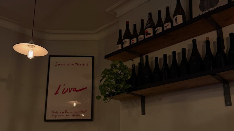 Wines and signage inside Antidote Wine Bar