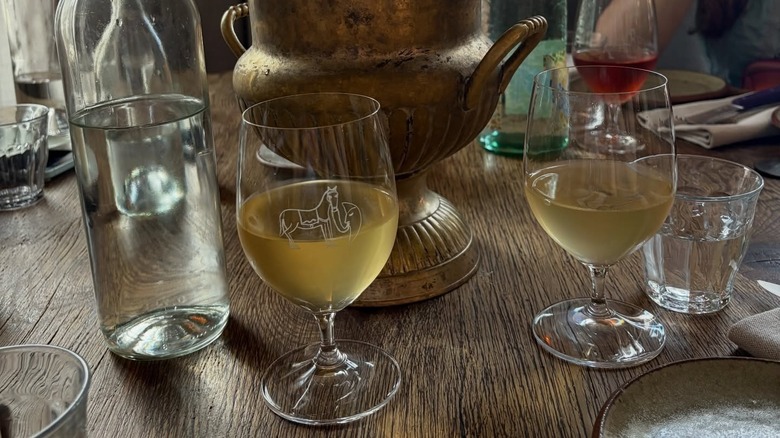 Wines being served in glasses at Goodbye Horses