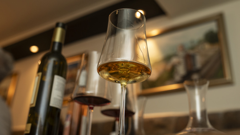 Glass of white wine on a bar