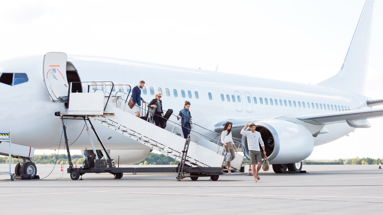 Passengers deboarding a plane