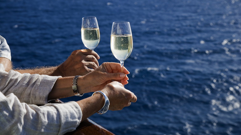 Couple enjoying wine on a cruise