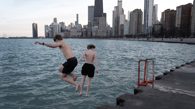 Two boys jump into Lake Michigan