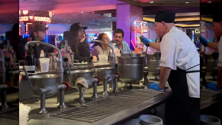 A chef operates the steam cookers at Palace Station Oyster Bar