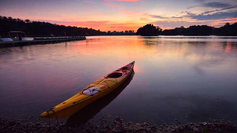 Canoe on the water at sunset at Middle Saranac Lake in New York