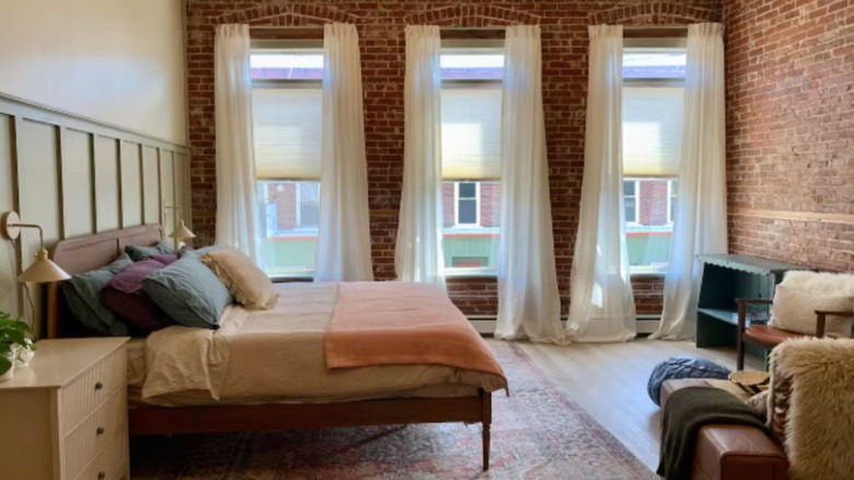 cozy hotel room in brick building