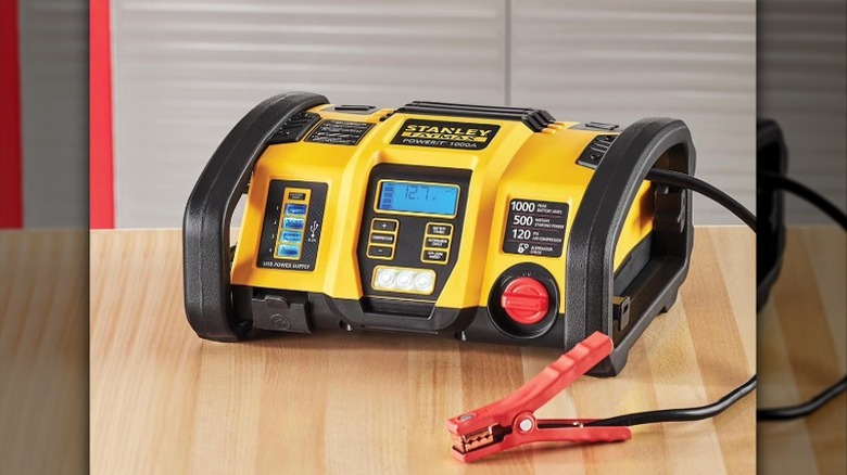 Yellow and black Stanley Power Station on wooden table