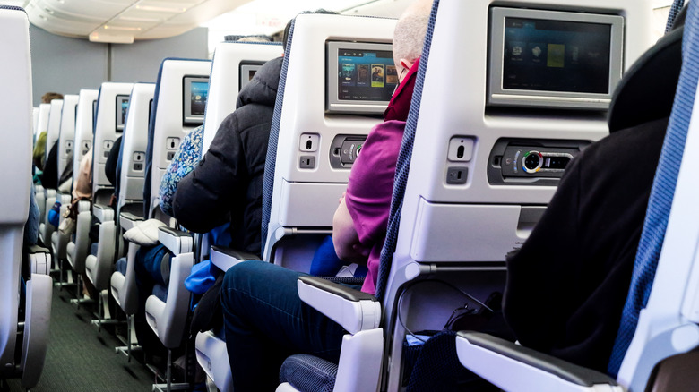 Passengers seated on a plane