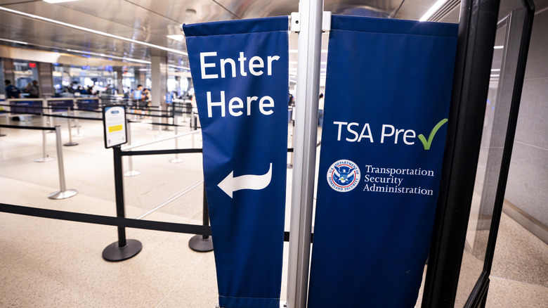 TSA PreCheck security entrance sign at an airport
