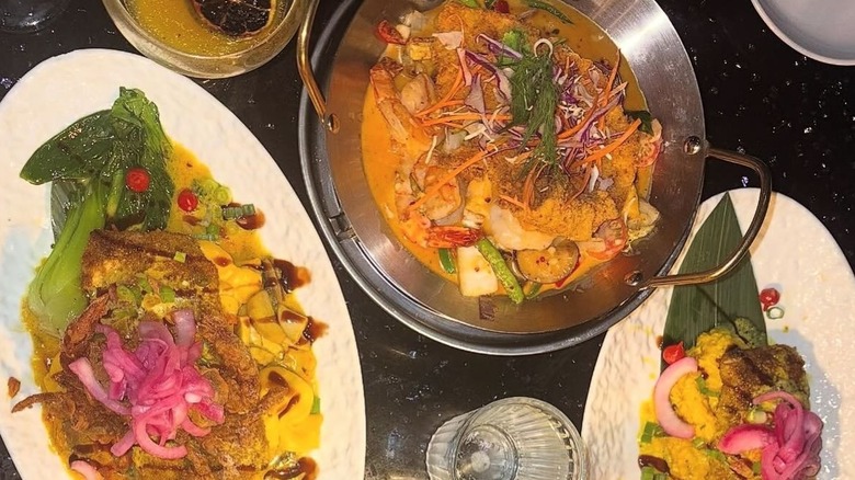 Overhead shot of several dishes at Poor Calvin's