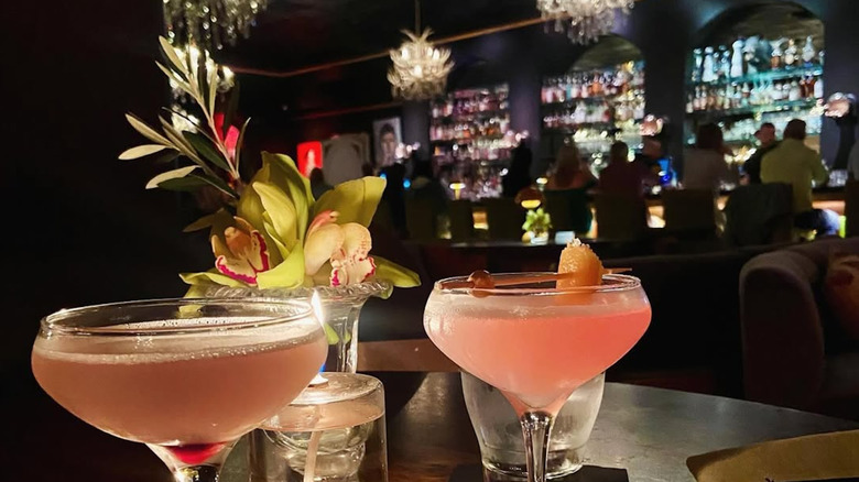 A pair of cocktails on a table at The Gin Joint, Charleston