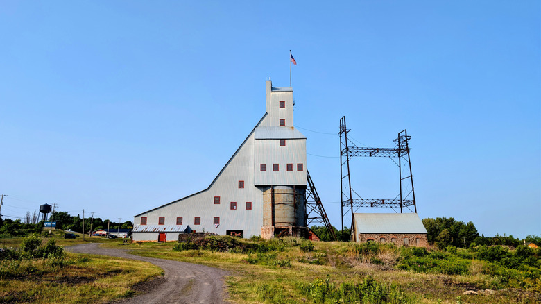The largest steam hoist in the world at the Quincy Mine in Hancock at the start of the Copper Country Byway, a tall grey, angular building