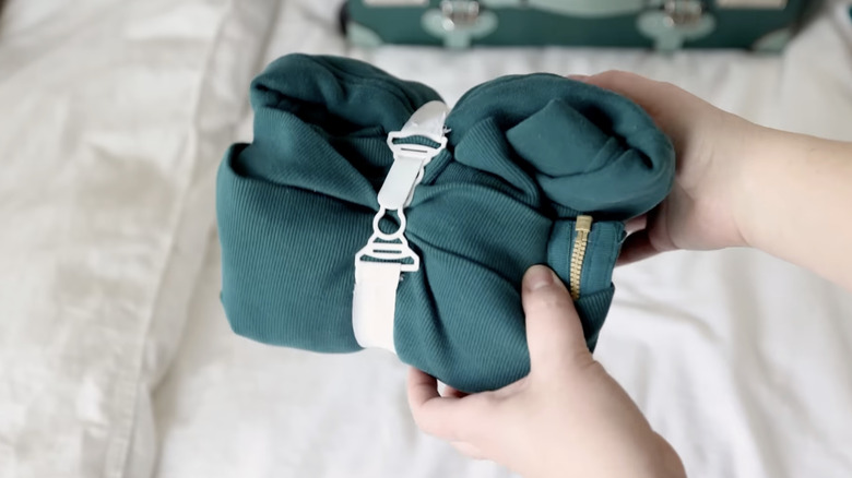 dollar tree sheet gripper compressing a hoodie