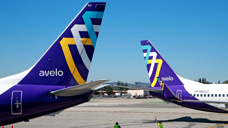 The tails of two planes from Avelo Airlines in Burbank, CA
