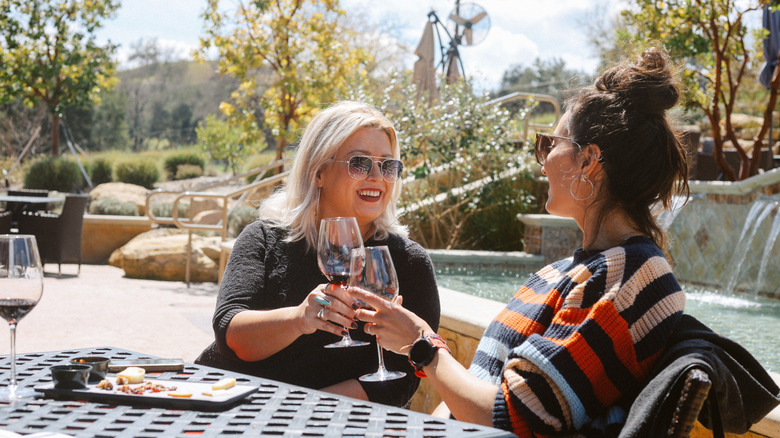 Two friends enjoying wine in Paso Robles