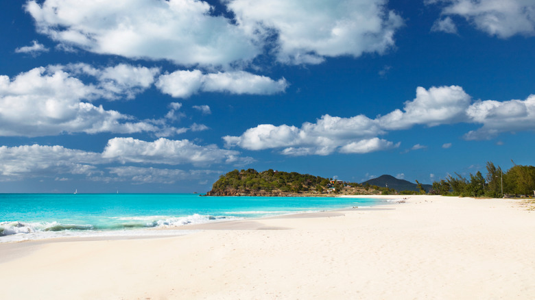 Ffryes Beach on Antigua with white powder sand and vibrant blue water