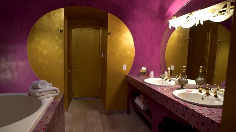 The Genie's Bottle Suite features a soaking tub and rounded corners