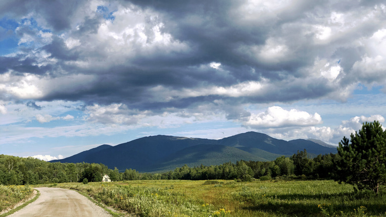 Views of Mt. Marcy and high peaks wilderness under a heavy blanket of clouds.