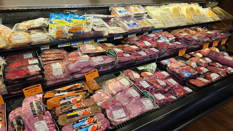 Swedish meats and cheese on shelves at the butcher in Economy Hometown Market in Stromsburg.
