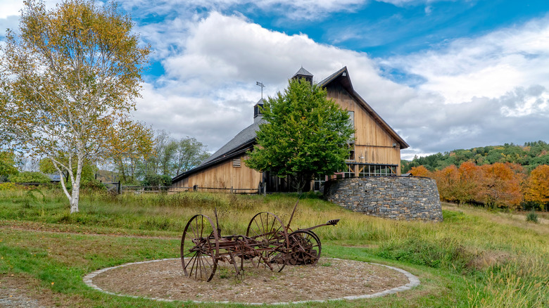 The remains of an old tractor are displayed in front of the Guilford Welcome Center in Vermont