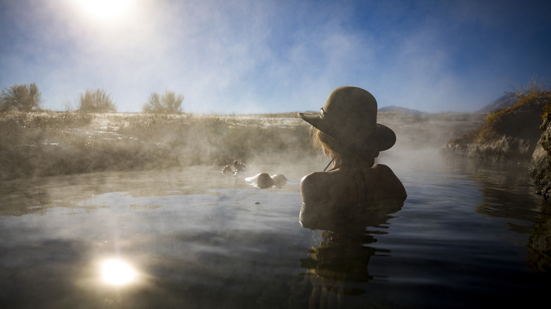 Woman bathing in a natural hot spring