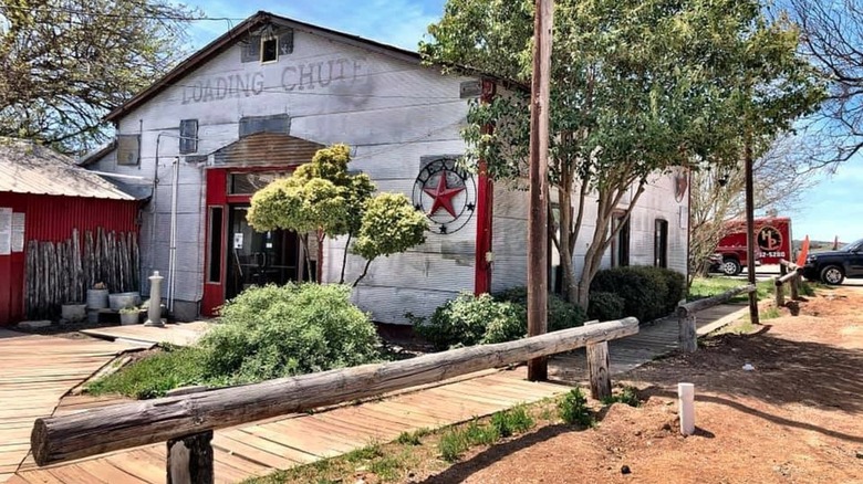 The exterior of the Hitchin' Post Steakhouse in Ozona, Texas