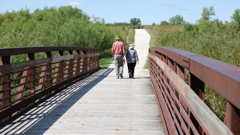 Two people walking in James "Pate" Philip State Park