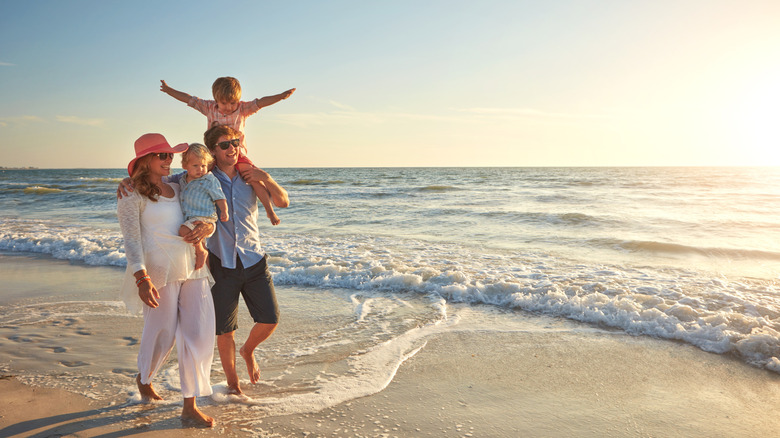 A family on vacation on the beach