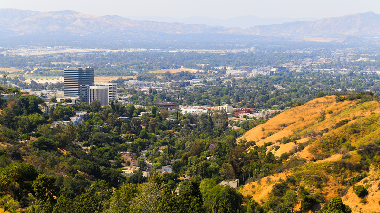Aerial view of buildings and mountains in Sherman Oaks.
