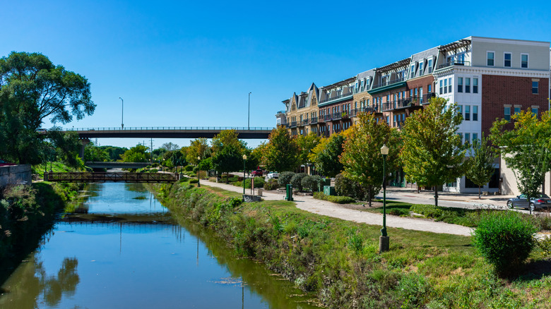 A canal in Lemont, Illinois, a suburb of Chicago with an apartment building