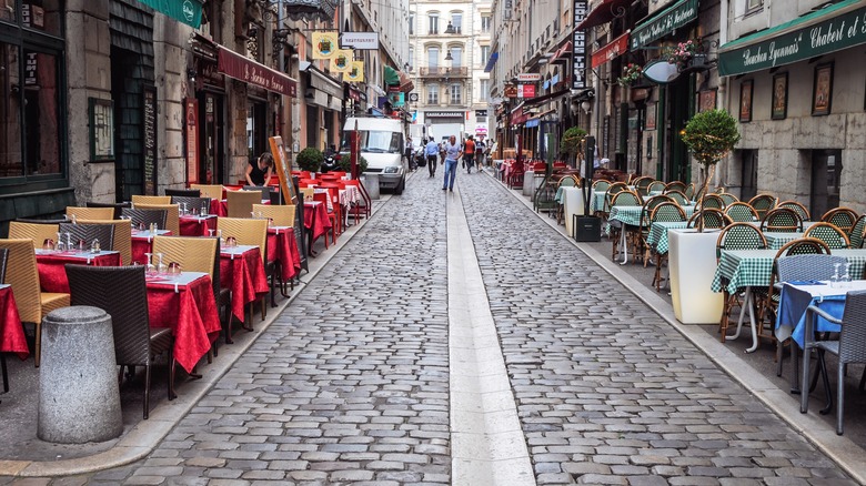 Restaurant-lined French street