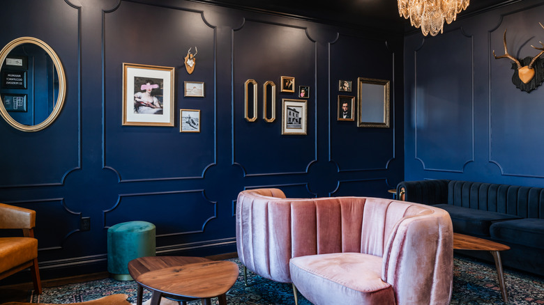 Hotel Melrose lobby with blue walls and velvet vouches.