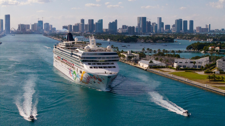 The Norwegian Pearl vessel departs from Miami, Florida, on a bright day.