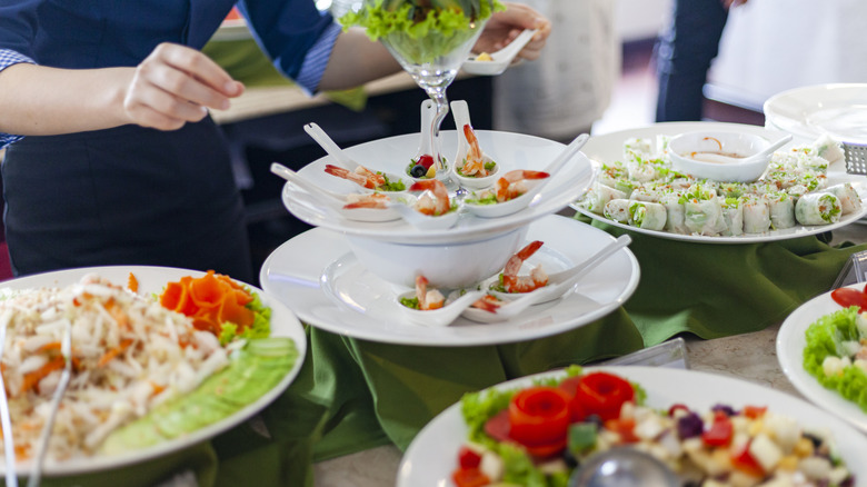 Close-up image of various plates on offer at a buffet lunch on a cruise ship.